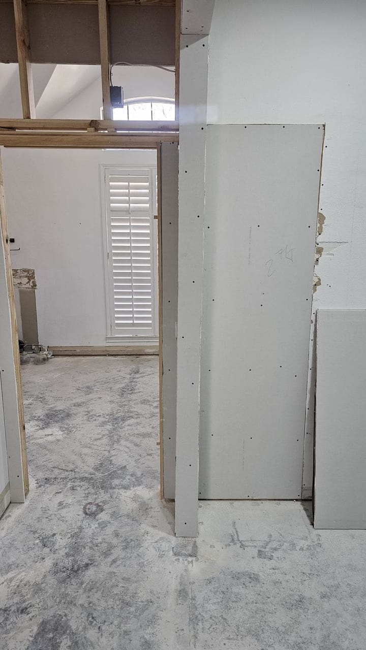 Bright remodeled home interior with marble flooring and clean finishes